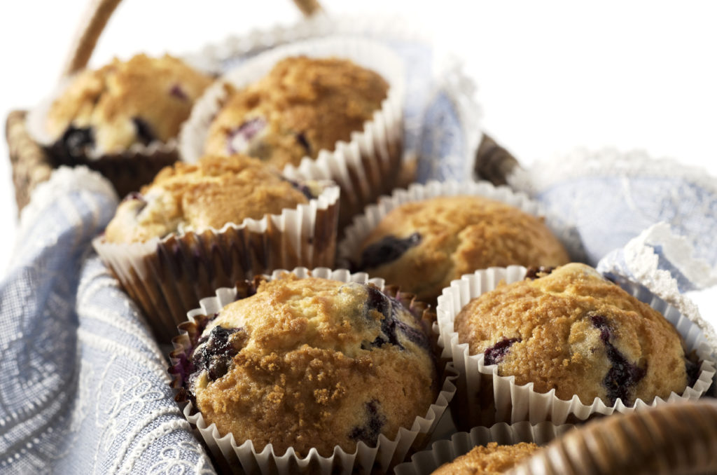 Close-up of blueberry muffins in rectangular basket