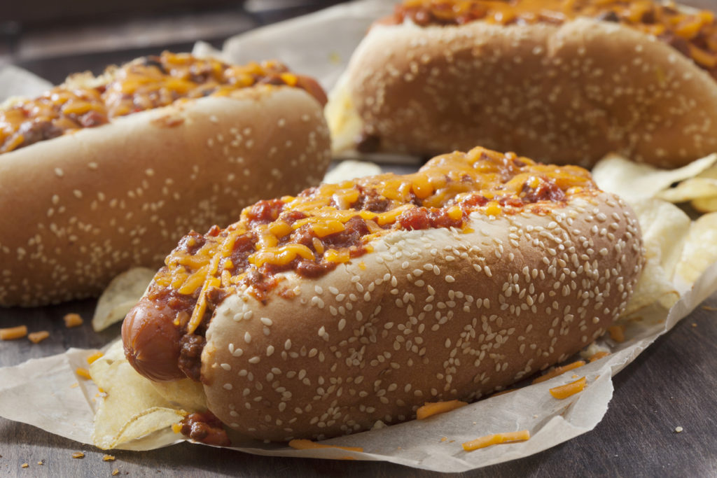 Hot dogs topped with cheese